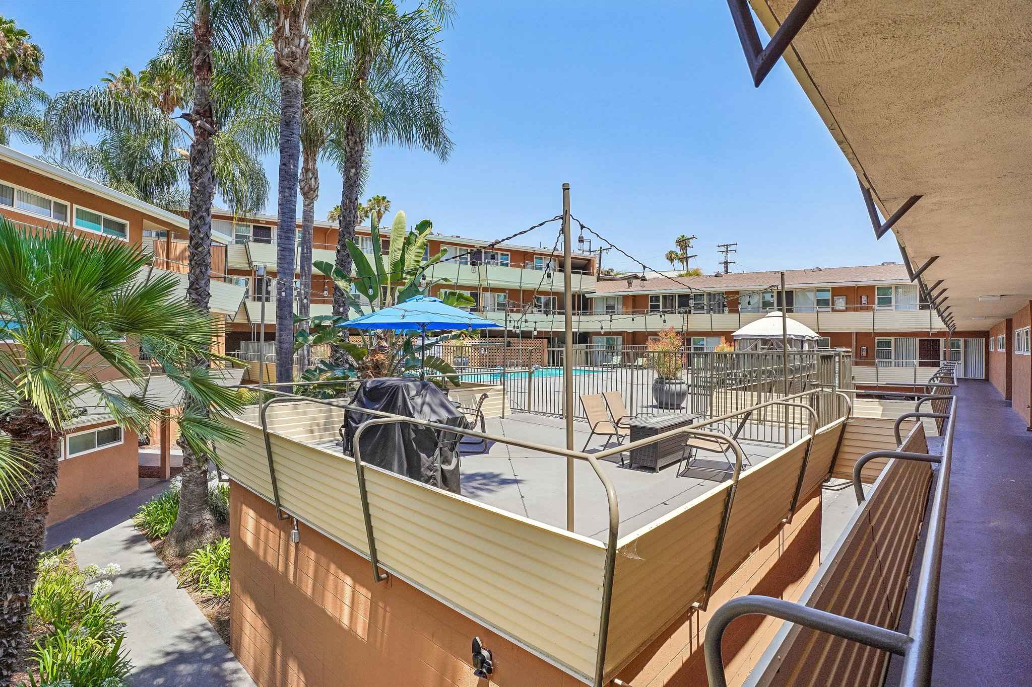 bbq grill deck pool view at Terraces