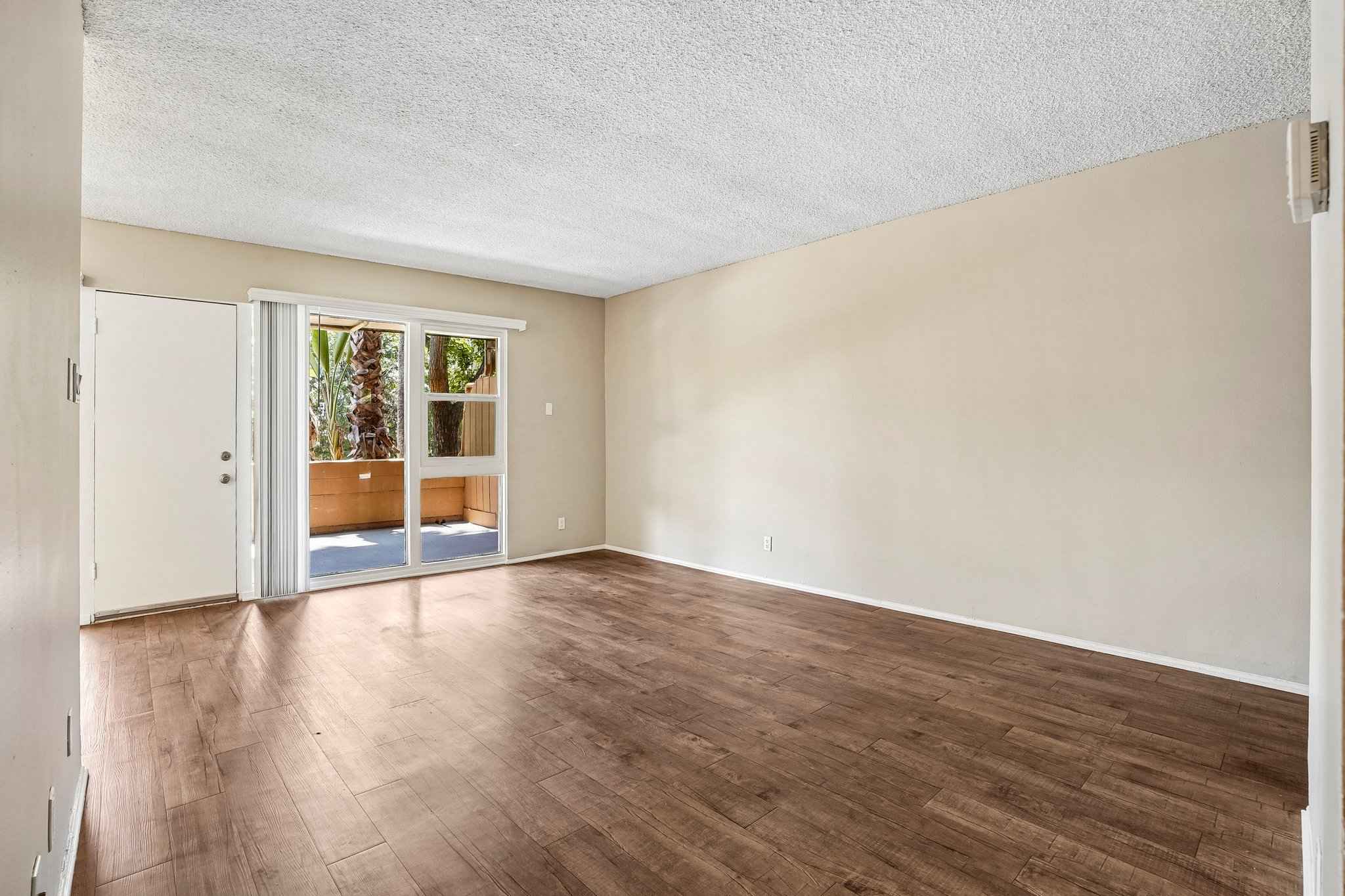 living room entry patio slider at Terraces