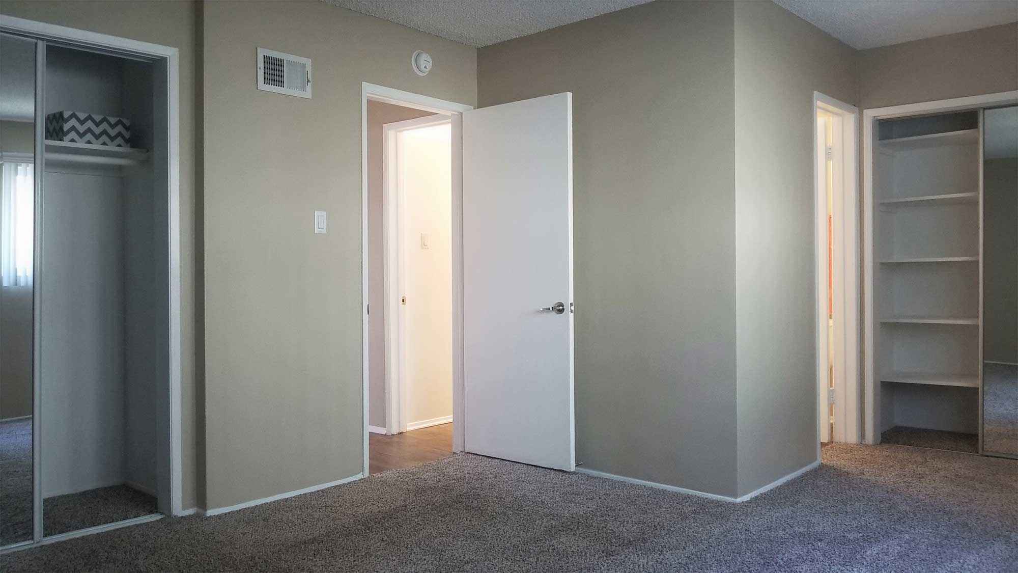 bedroom two closets doorway at Terraces
