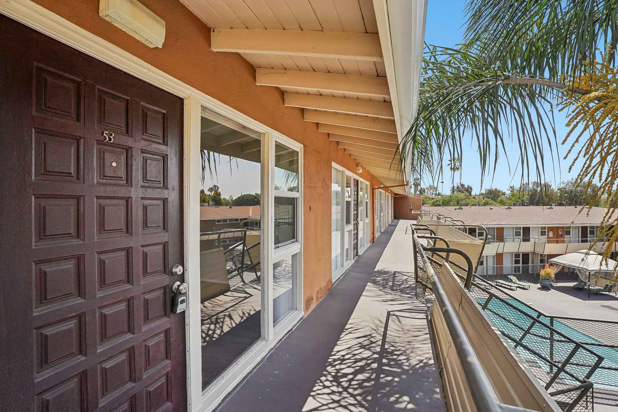 second floor walkway unit entry at Terraces