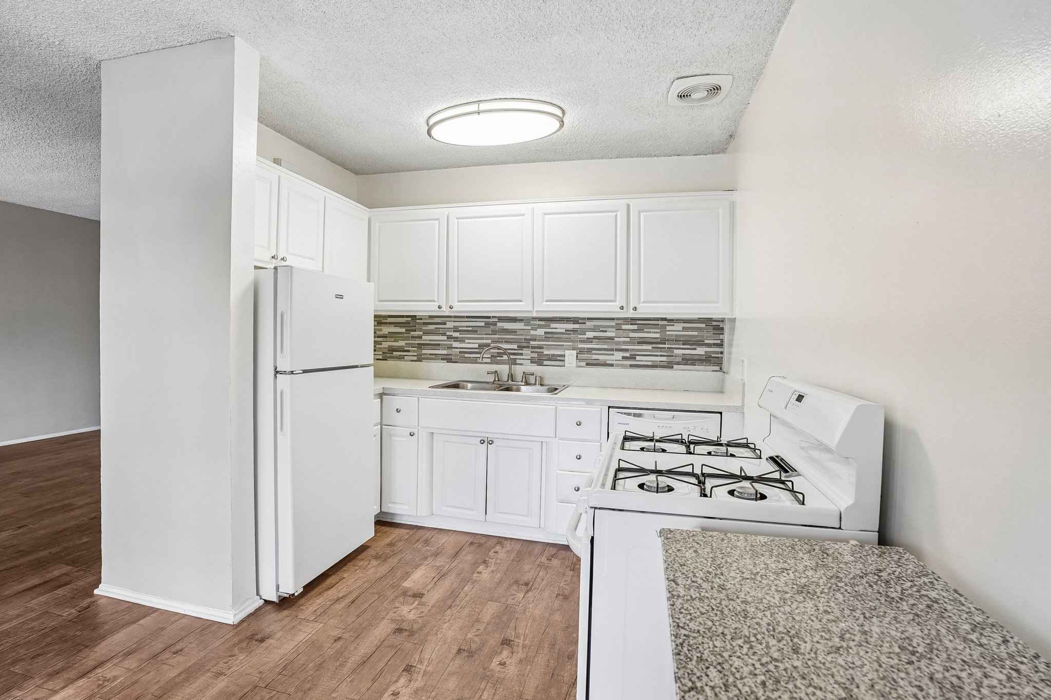 kitchen breakfast bar tile backsplash at Terraces