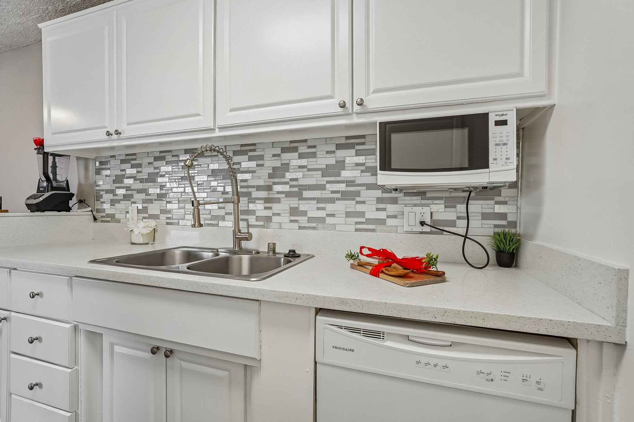 kitchen sink microwave dishwasher at Terraces