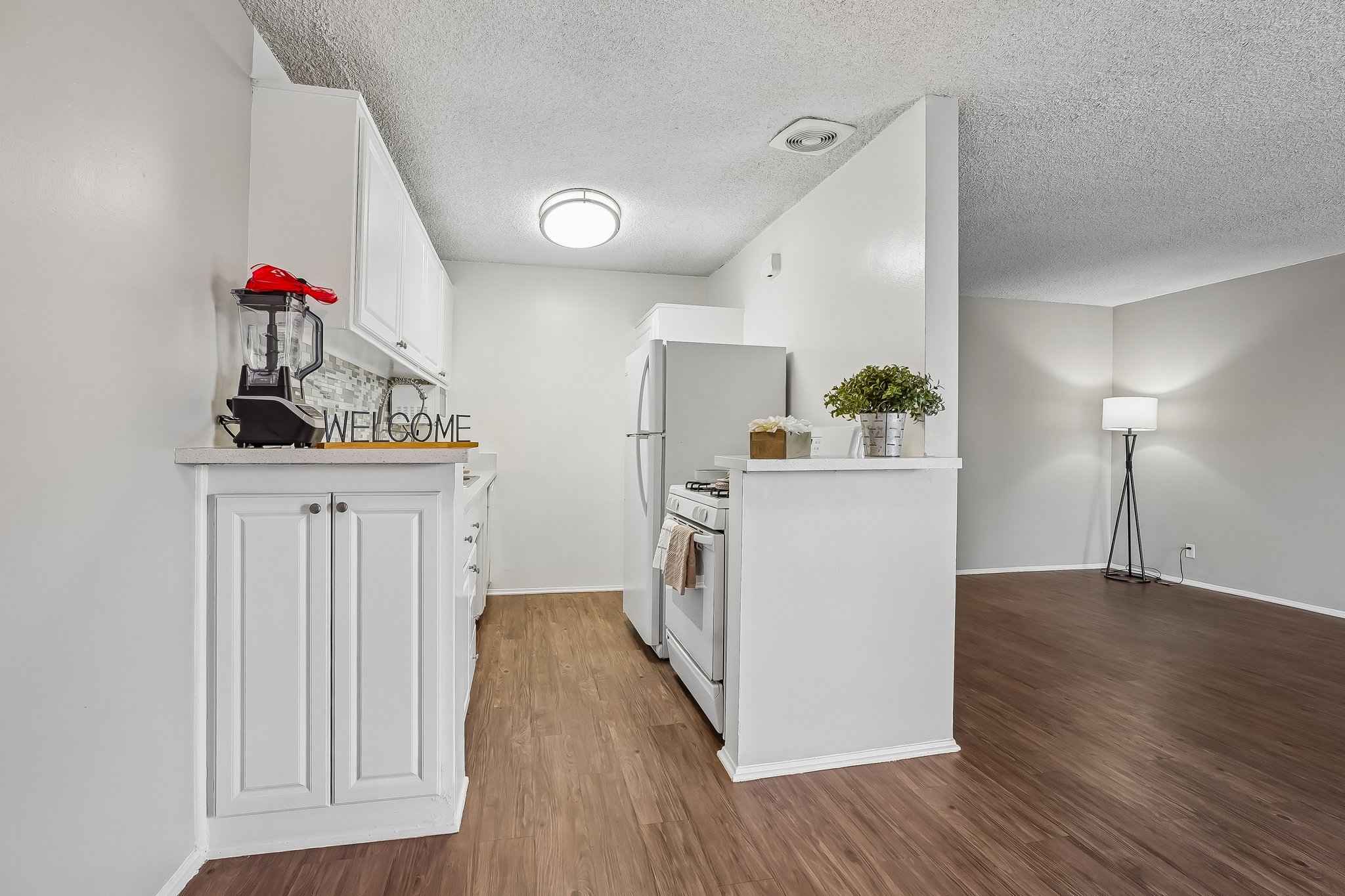 galley kitchen open to living at Terraces