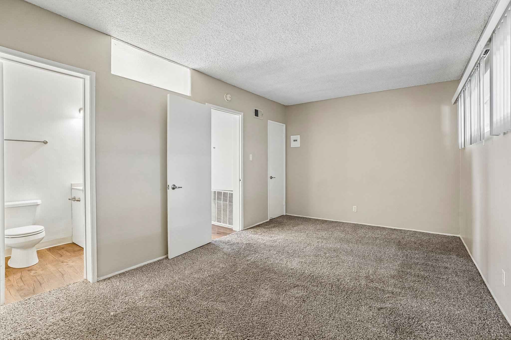 bedroom carpet bathroom access at Terraces