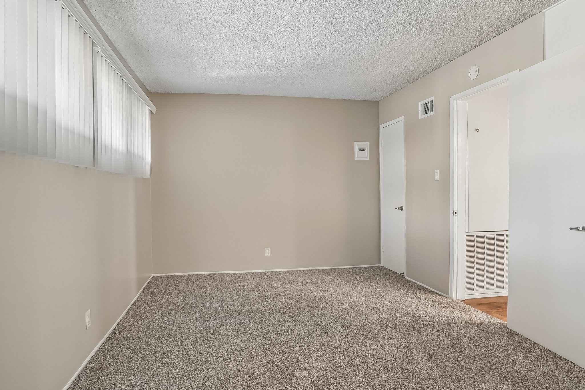 bedroom carpet closet doors at Terraces