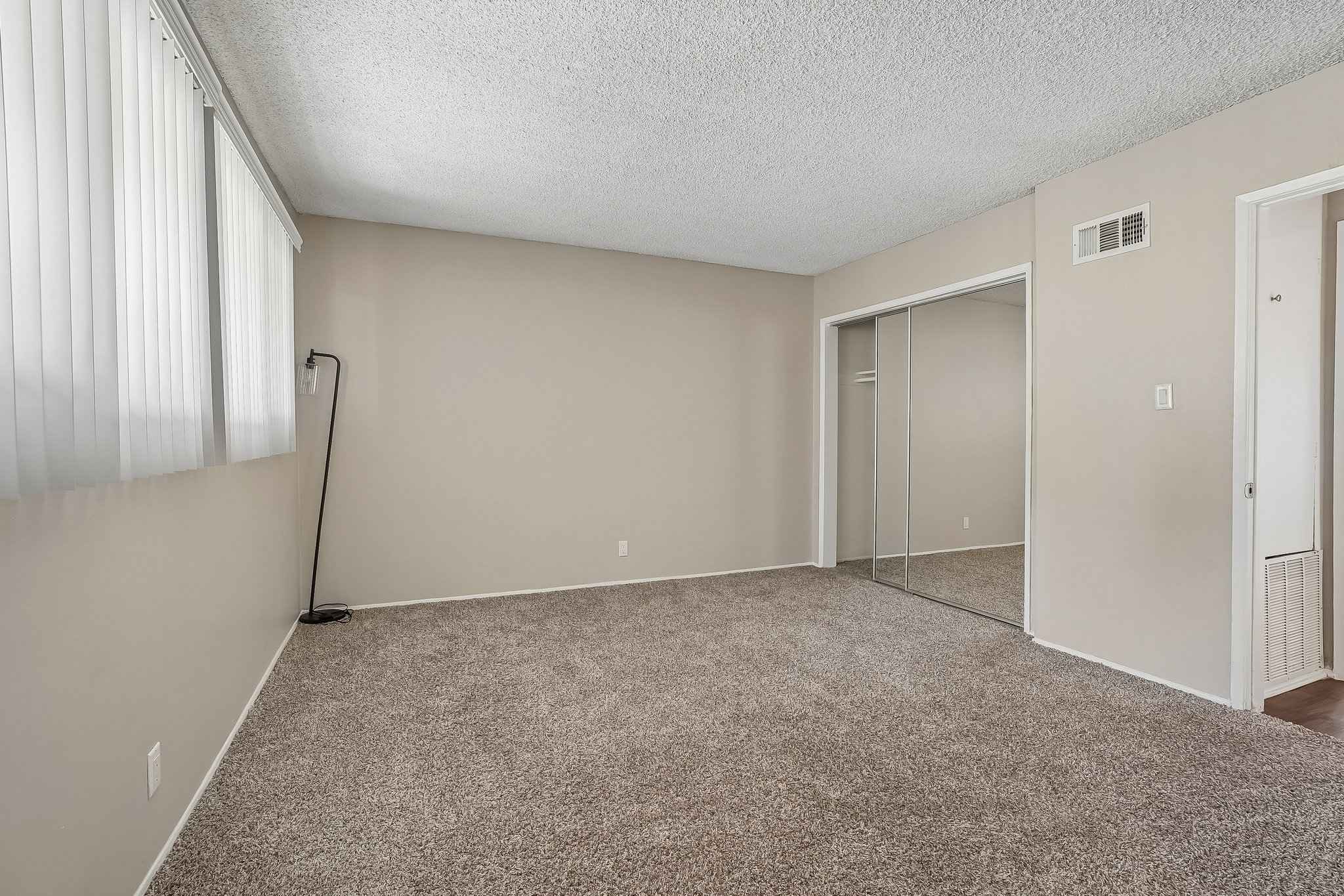 bedroom closet carpet window at Terraces